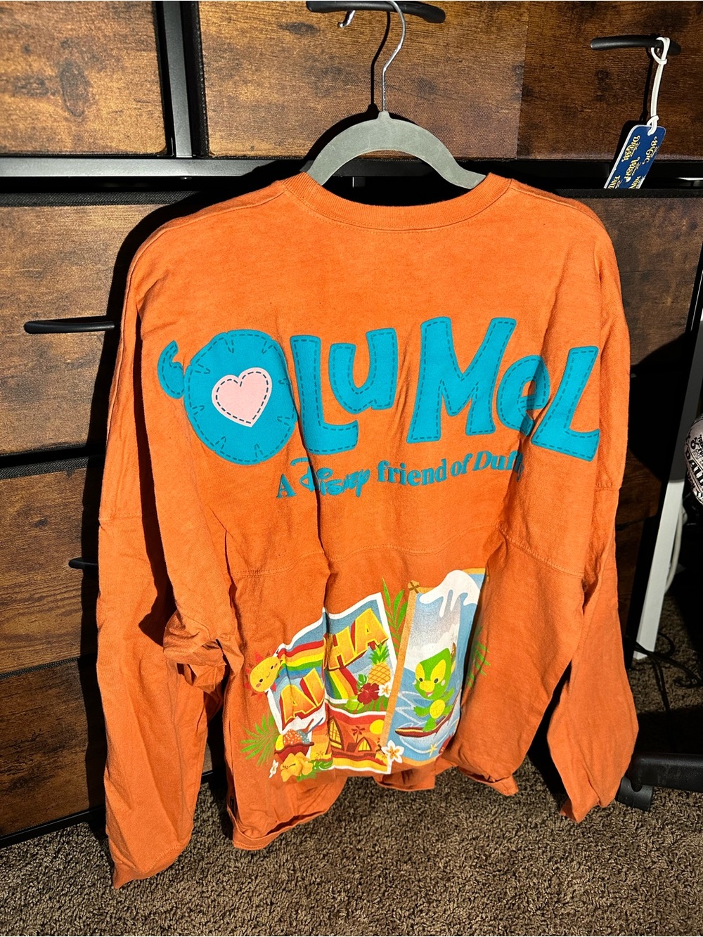 Disney Aulani resort Olumel Graphic Long Sleeve Tee in Vibrant Orange